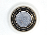 Inspection on a button cell battery